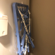 My beloved drying rack in “hibernation mode” on the side of my dryer.